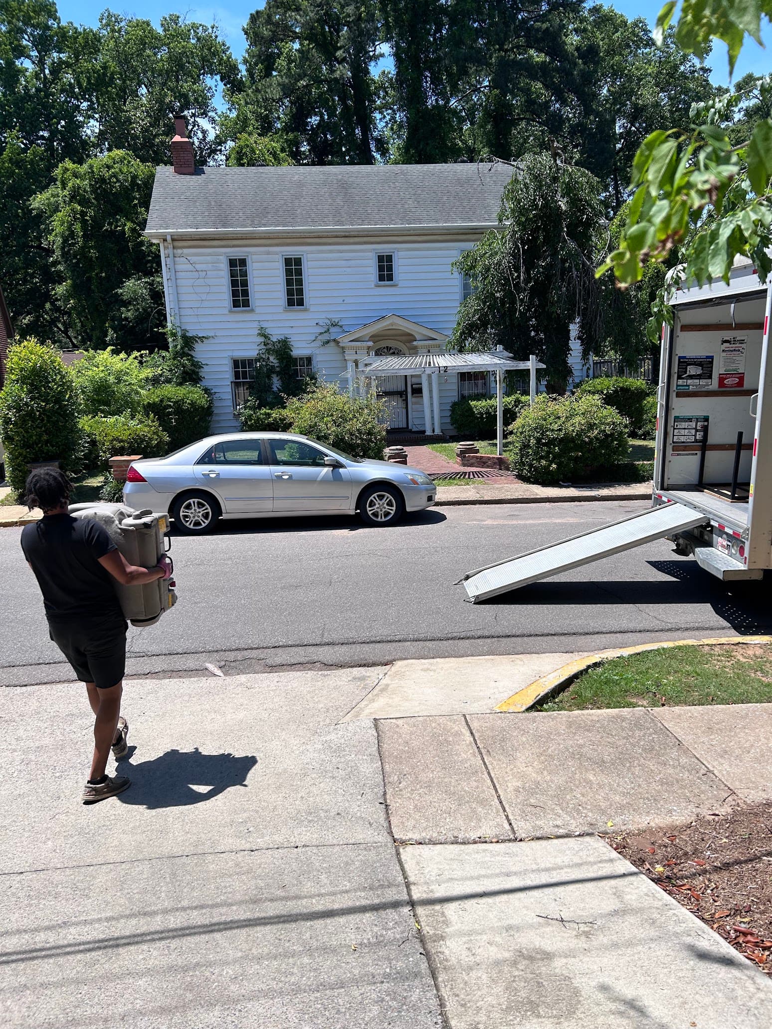 Truck loaded with furniture and debris for removal