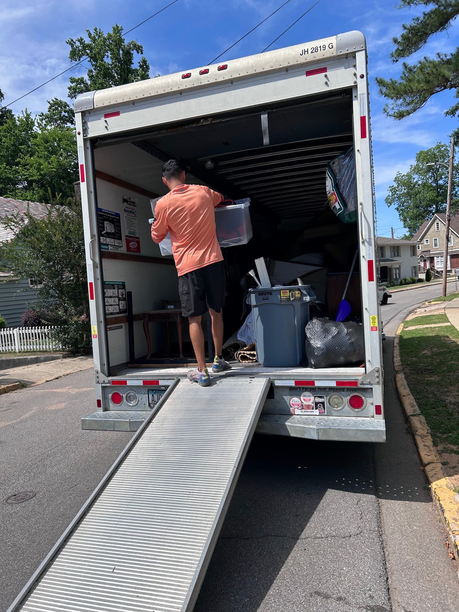 Haultide crew loading junk onto the truck in Tuscaloosa