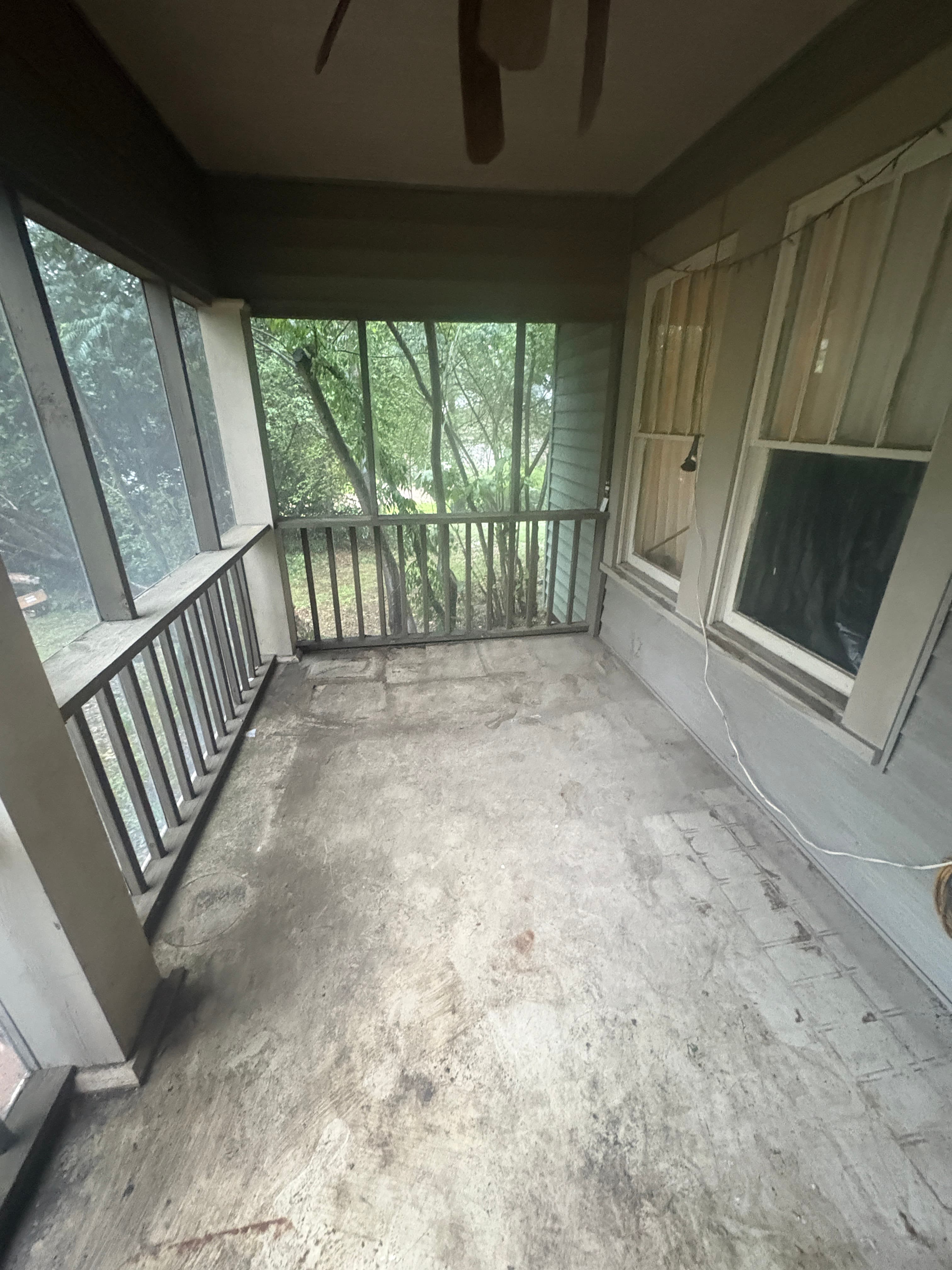 Swept, empty porch after a Haul Tide cleanout in Tuscaloosa