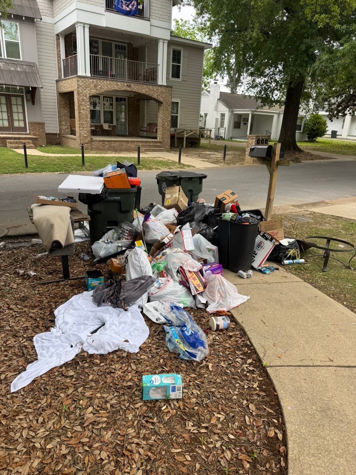 Pile of trash and junk before removal in Tuscaloosa