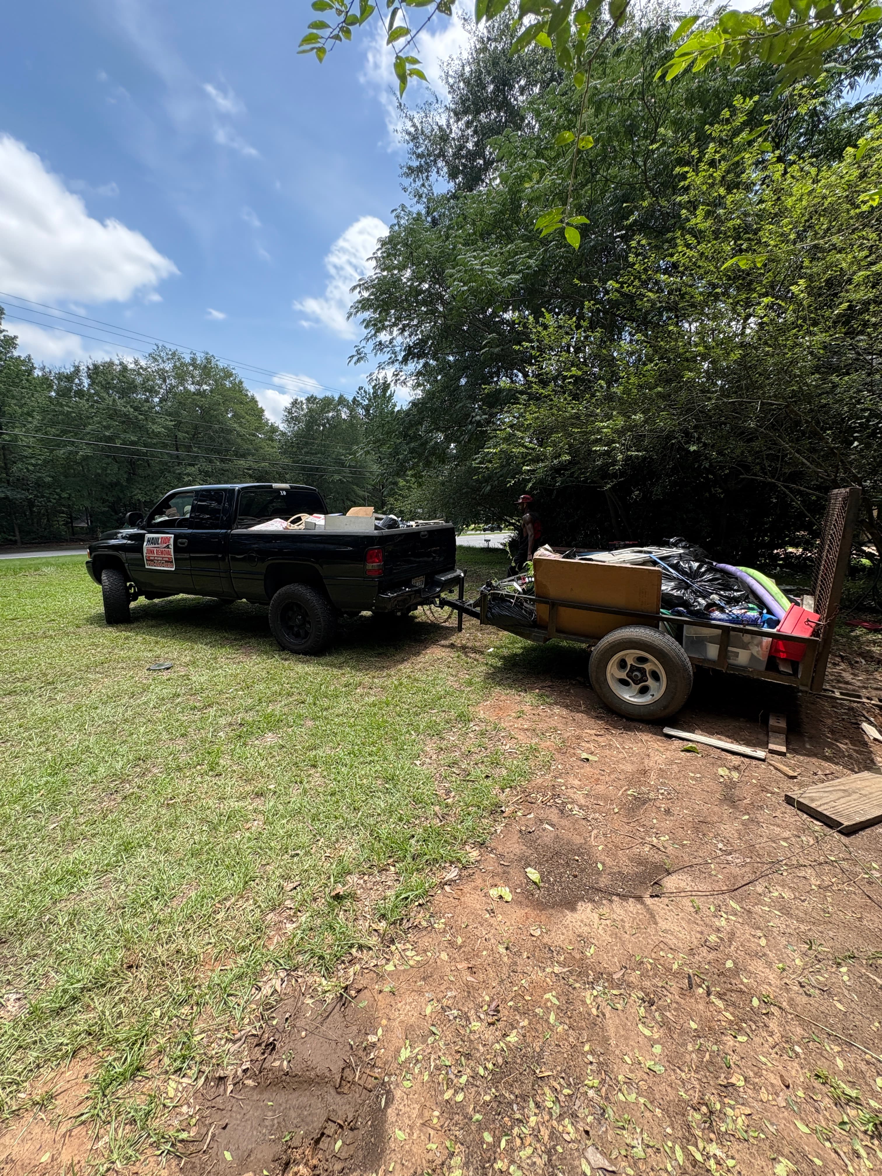 Haul Tide hauling truck with moving trailer ready for a job