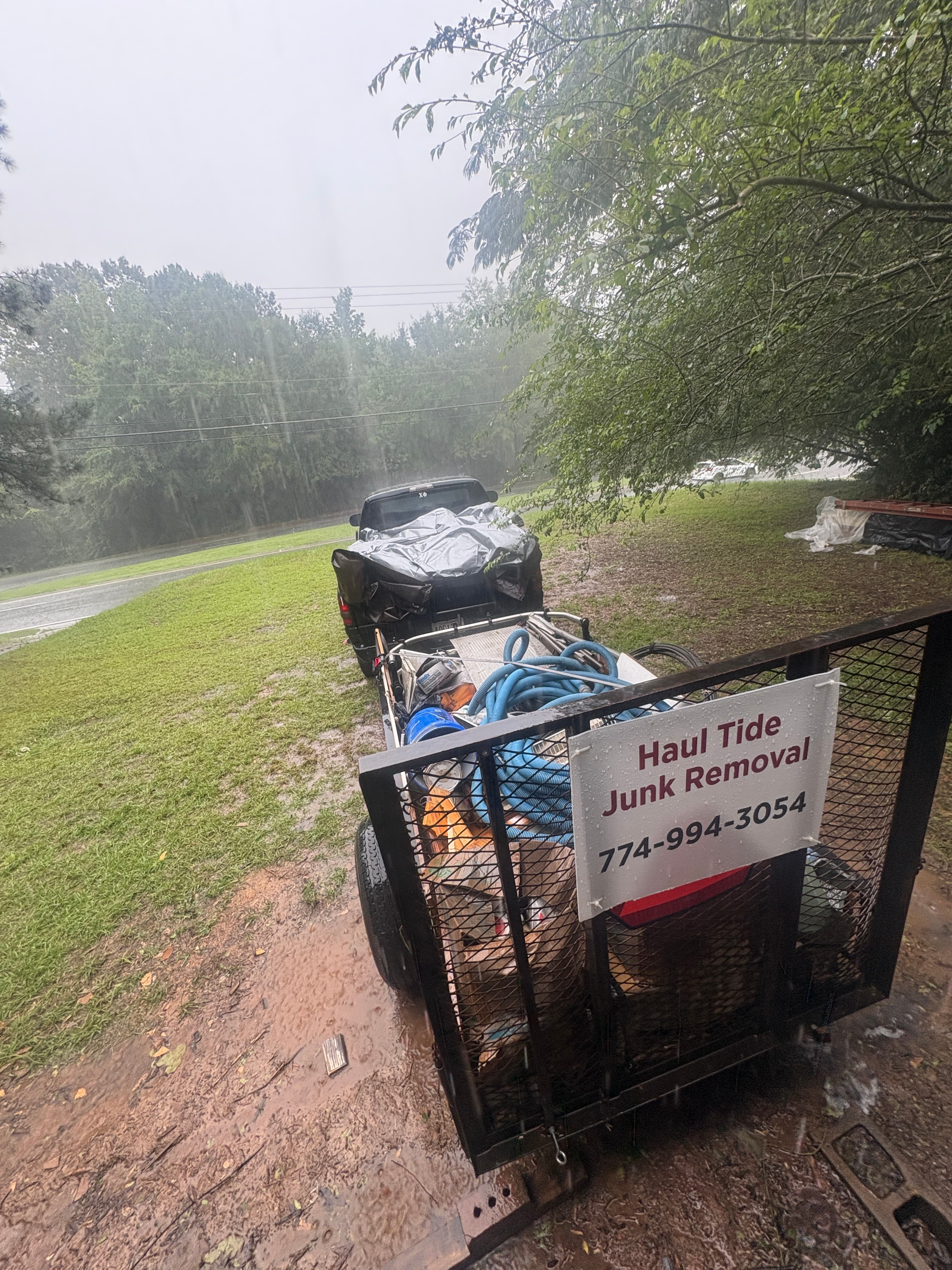 Haul Tide branded moving trailer with company signage in Tuscaloosa
