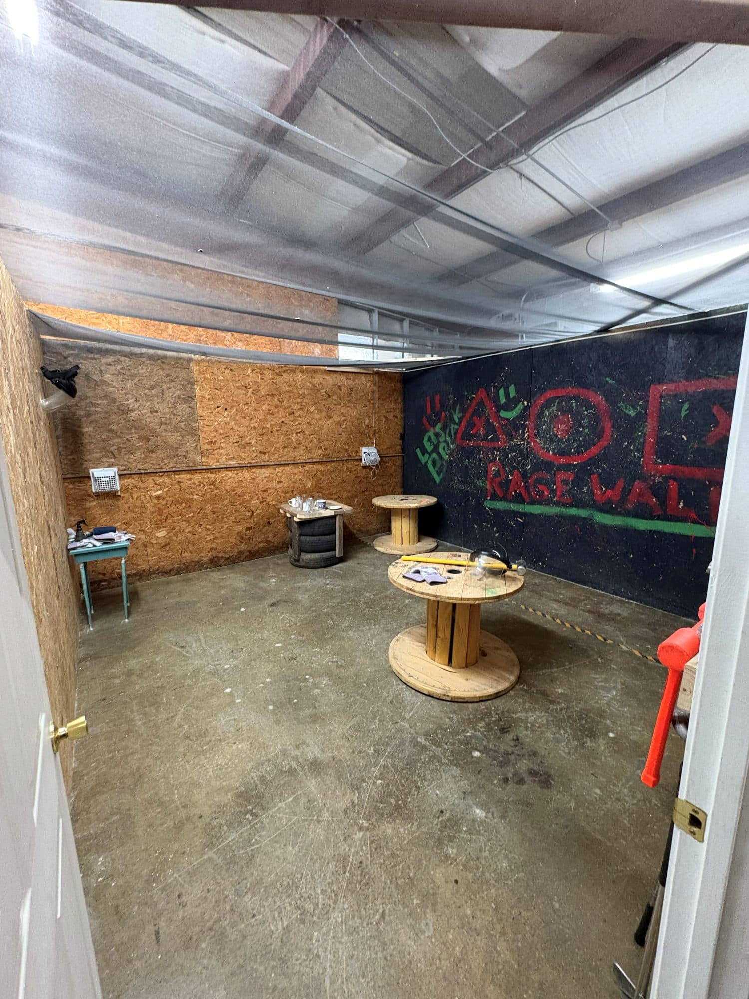 Empty, swept rage room after a Haul Tide cleanout in Tuscaloosa