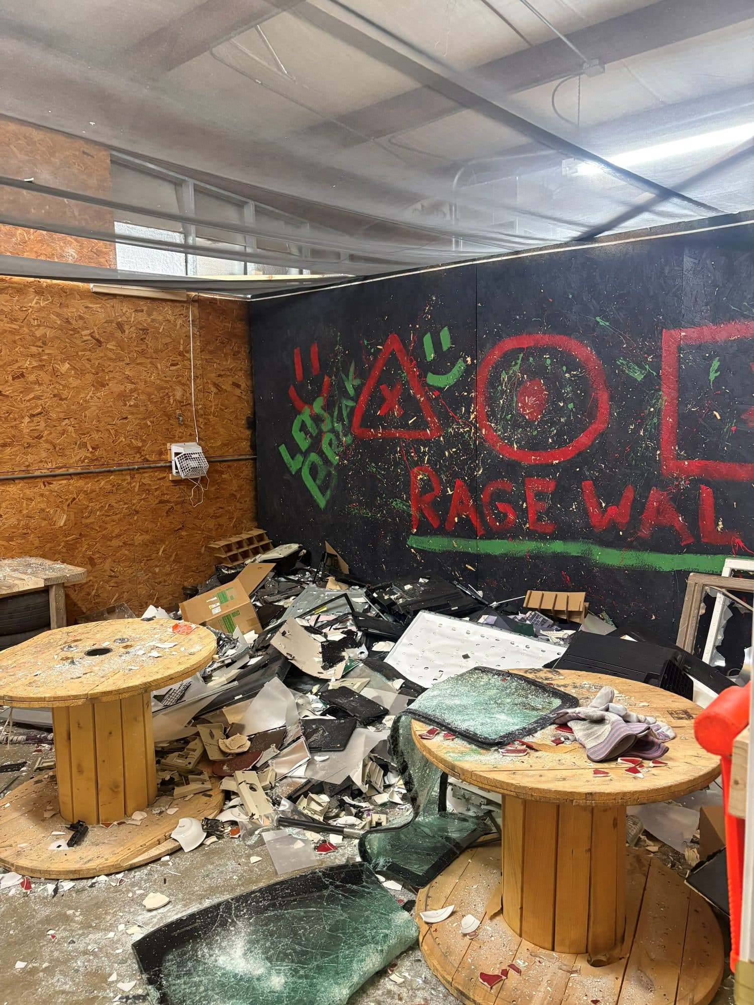 Rage room filled with broken debris before Haul Tide cleared it